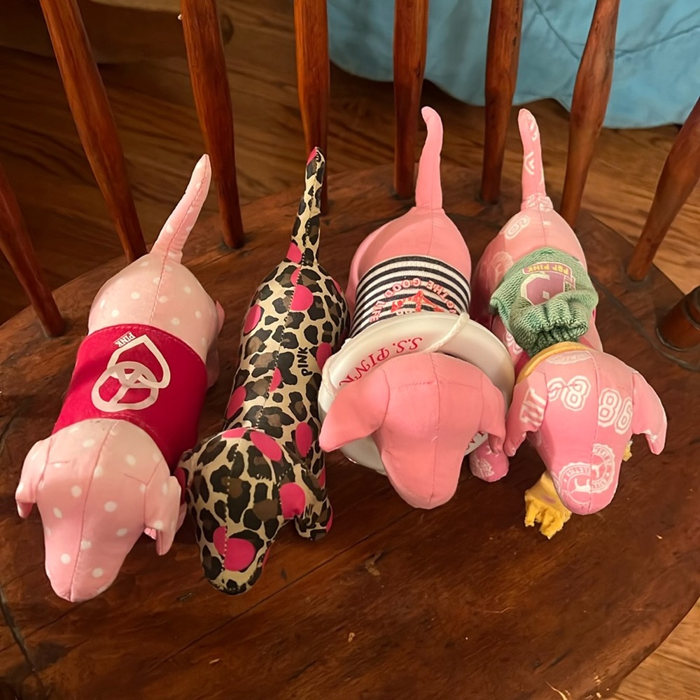 Set of four pink dogs